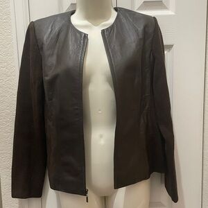 Women's chocolate Brown Leather Jacket. New condition!

💯% leather 
Wool sleeves